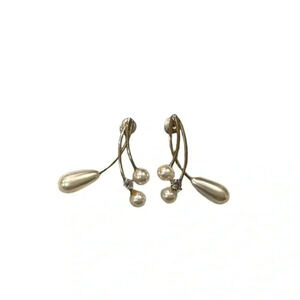 Pearl dangle earrings with stone accents